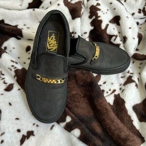 Black Vans with a gold buckle, US Men’s size 4 / Women’s size 5.5.